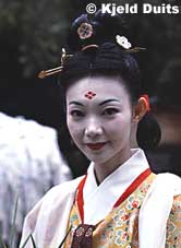 A young Japanese woman models an ancient hairdo during the 'Comb Festival' (Kushi Matsuri) at Yasui Konpira-gu, Kyoto, Japan.