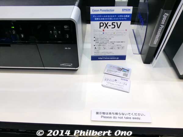 Epson booth had this weird label saying "Please do not take away." In Japanese it means "Do not take home the display model." Were they afraid that someone would walk away with a printer on display? 